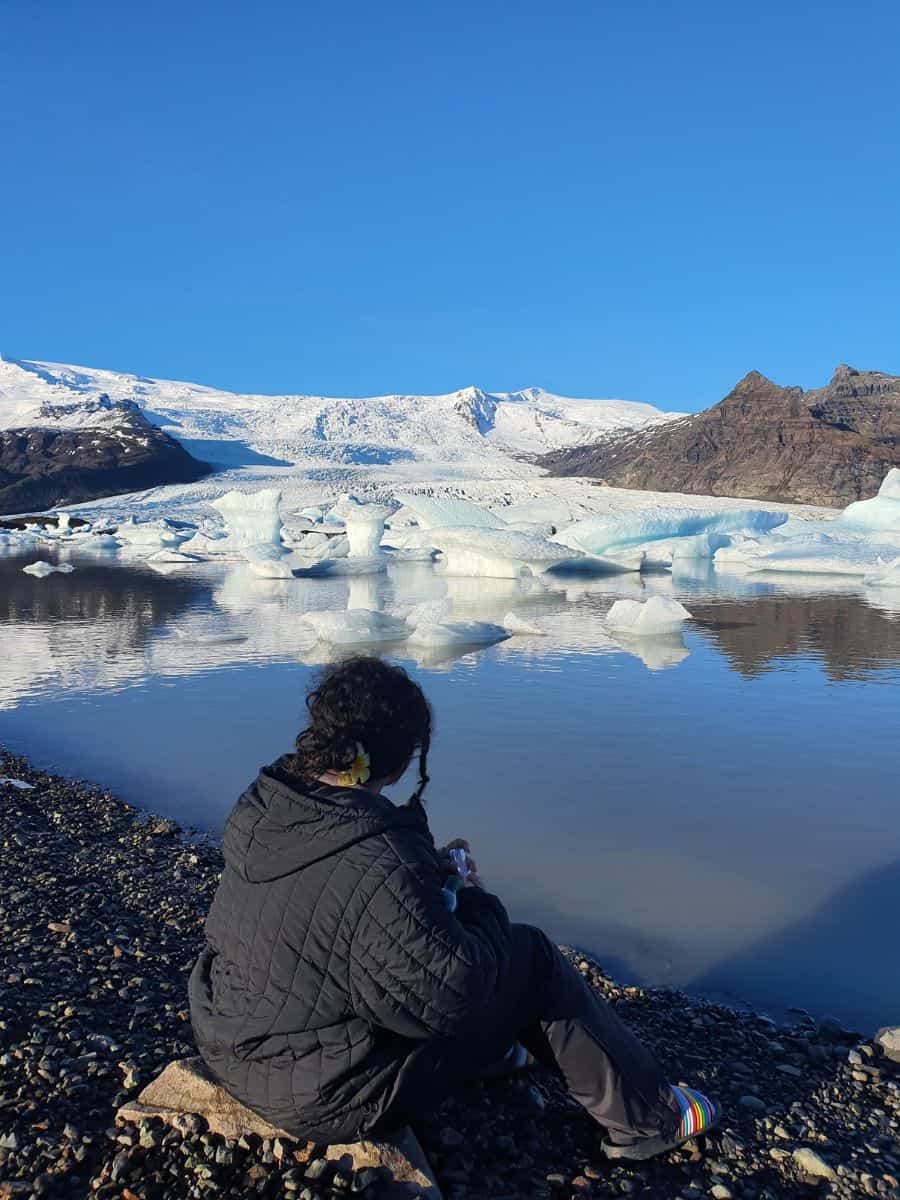 Teen watching Icebergs in Iceland