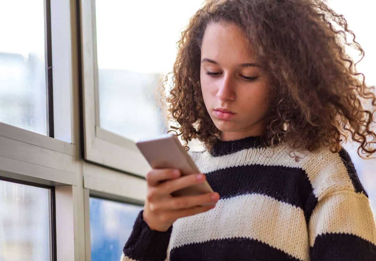 Teen on her phone