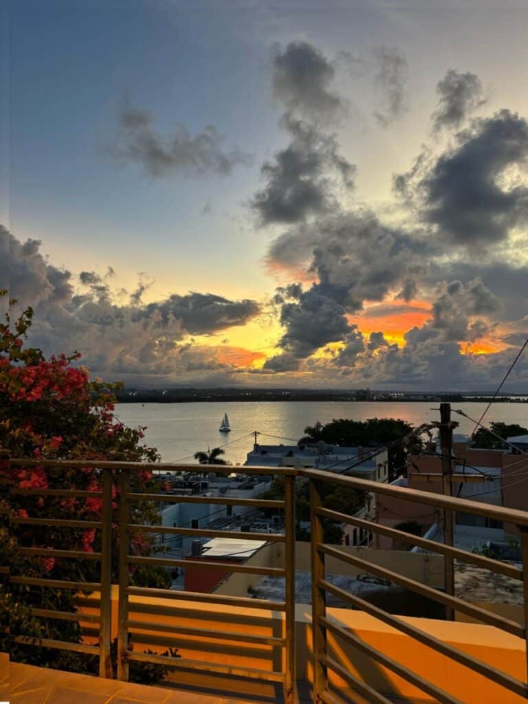 Sunset with a sailboat from the rooftop of El Convento