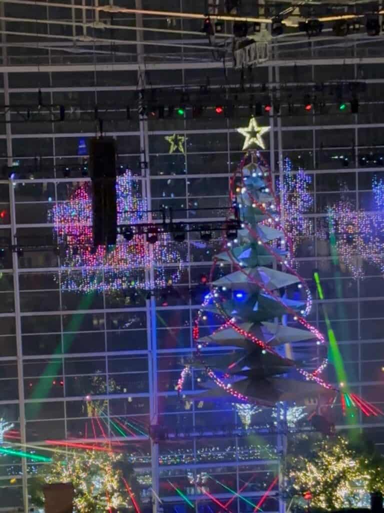 Seasonal Atrium Laser Light Show at the Gaylord with a a light up Christmas Tree and green and red lasers