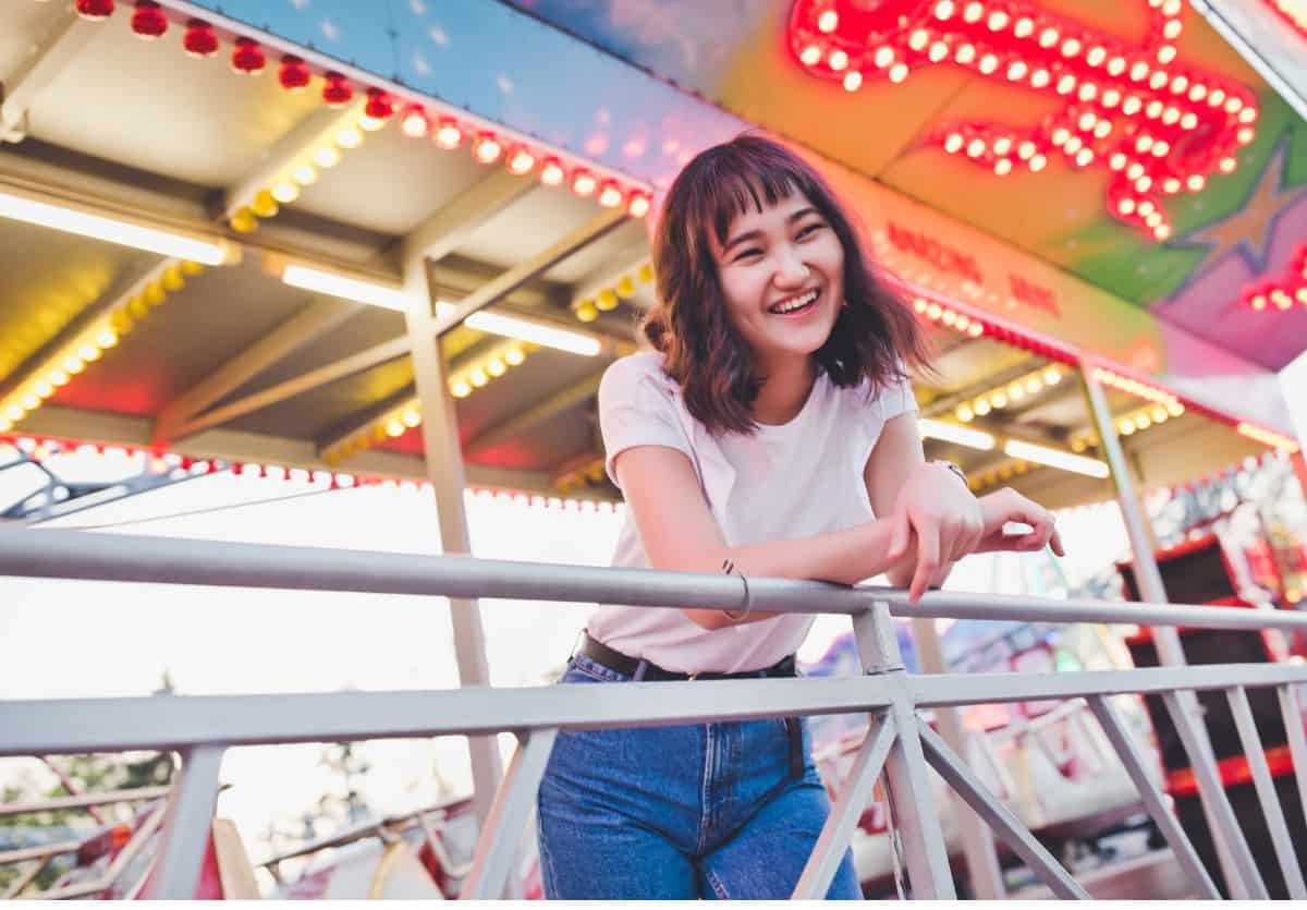 Teen Girl smiling at a carnival