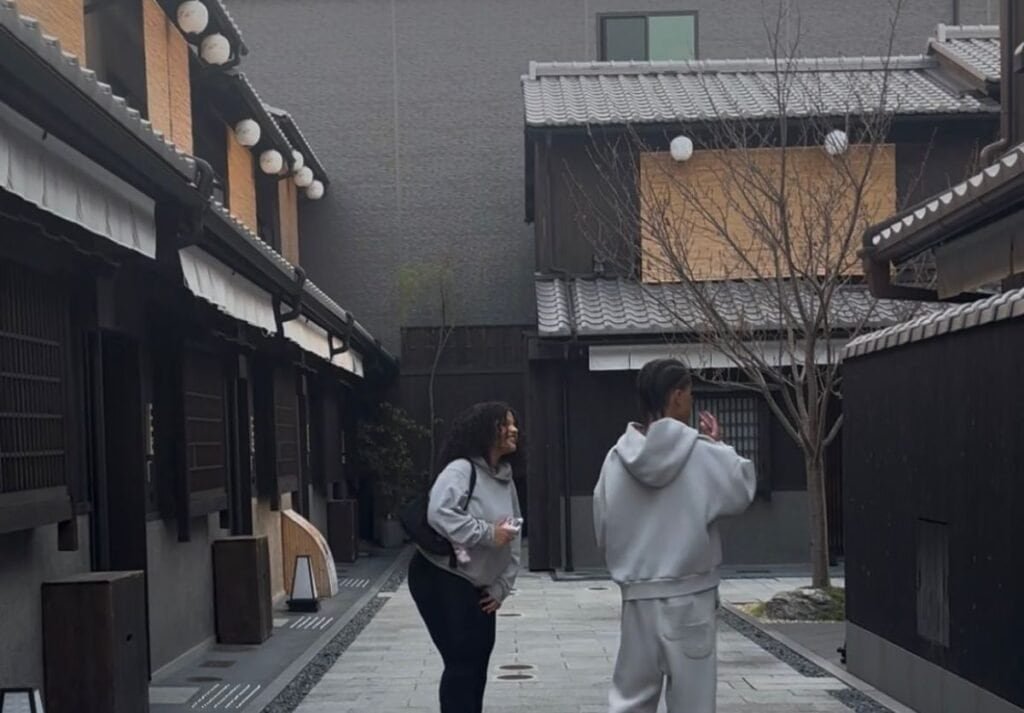 Two teens in the alley at Nazuna Kyoto Tsubaki St